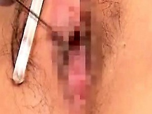 Hot young blonde girl strips and rubs her pussy close up